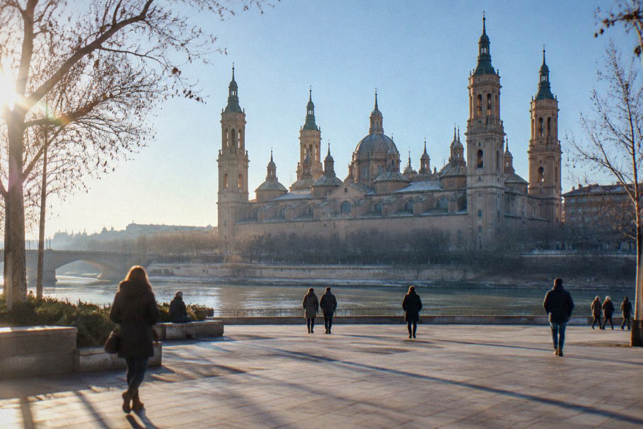 Zaragoza's Plaza del Pilar on a cold clear winter morning with the Basilica del Pilar and the Ebro behind it