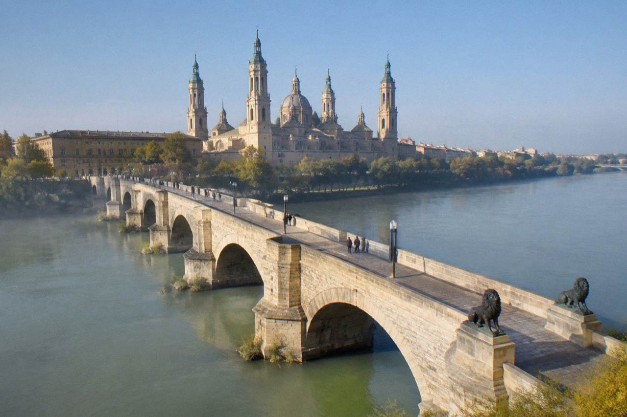 The Ebro river and Puente de Piedra in Zaragoza under a wide open sky