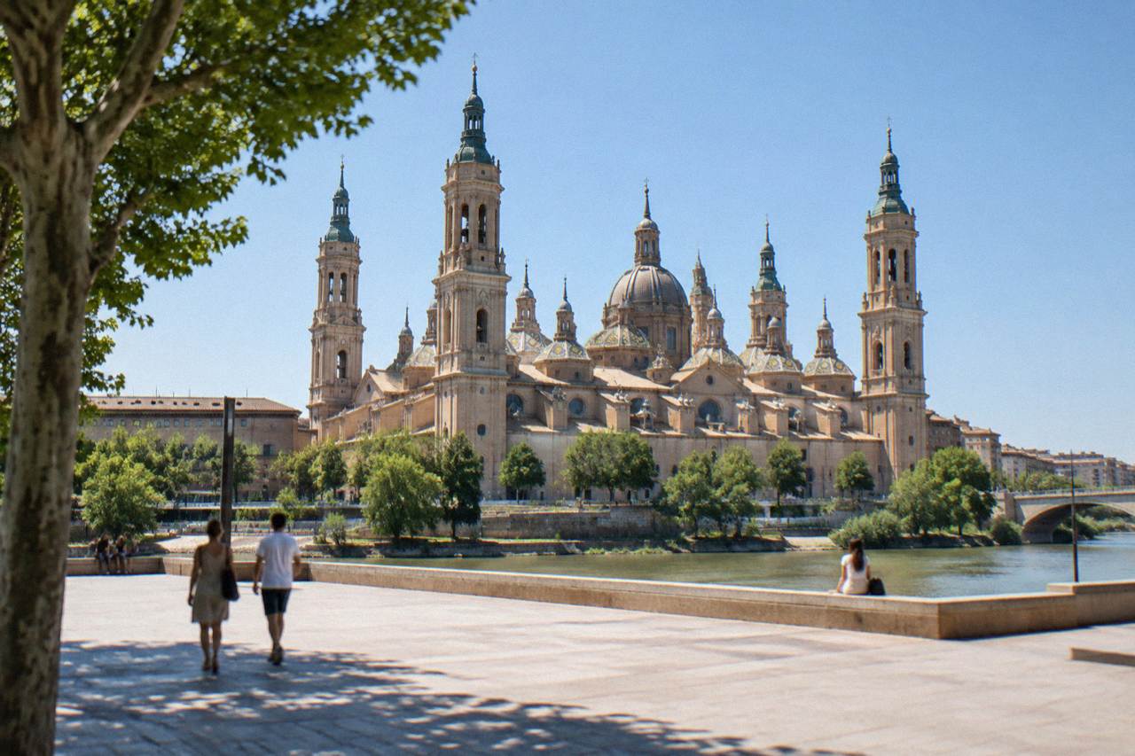 The Basílica del Pilar and the Ebro river in Zaragoza under a bright summer sky