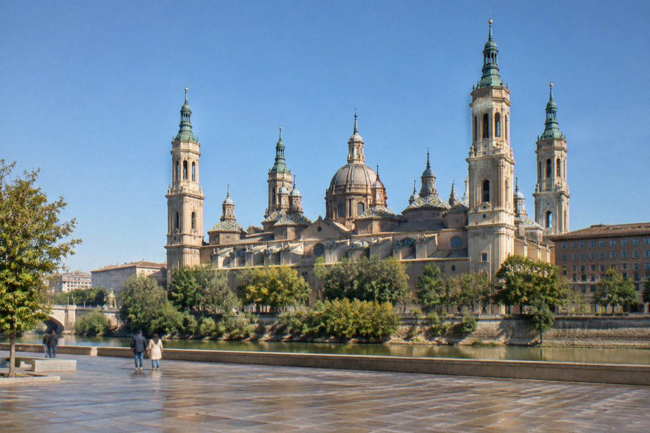 The Basilica del Pilar and its towers rising above the Ebro river in Zaragoza