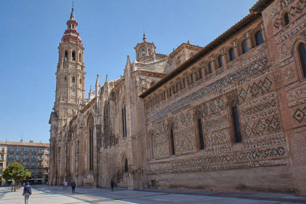 The Gothic and Mudejar exterior of La Seo Cathedral seen from the Plaza de la Seo in Zaragoza