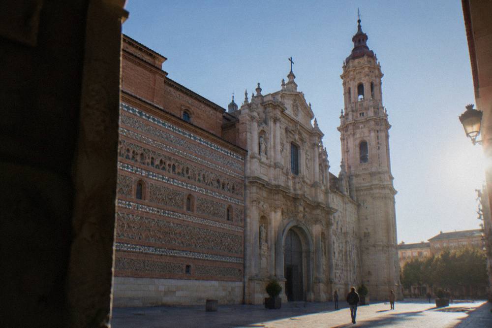 The baroque facade and doorway of La Seo Cathedral in daylight