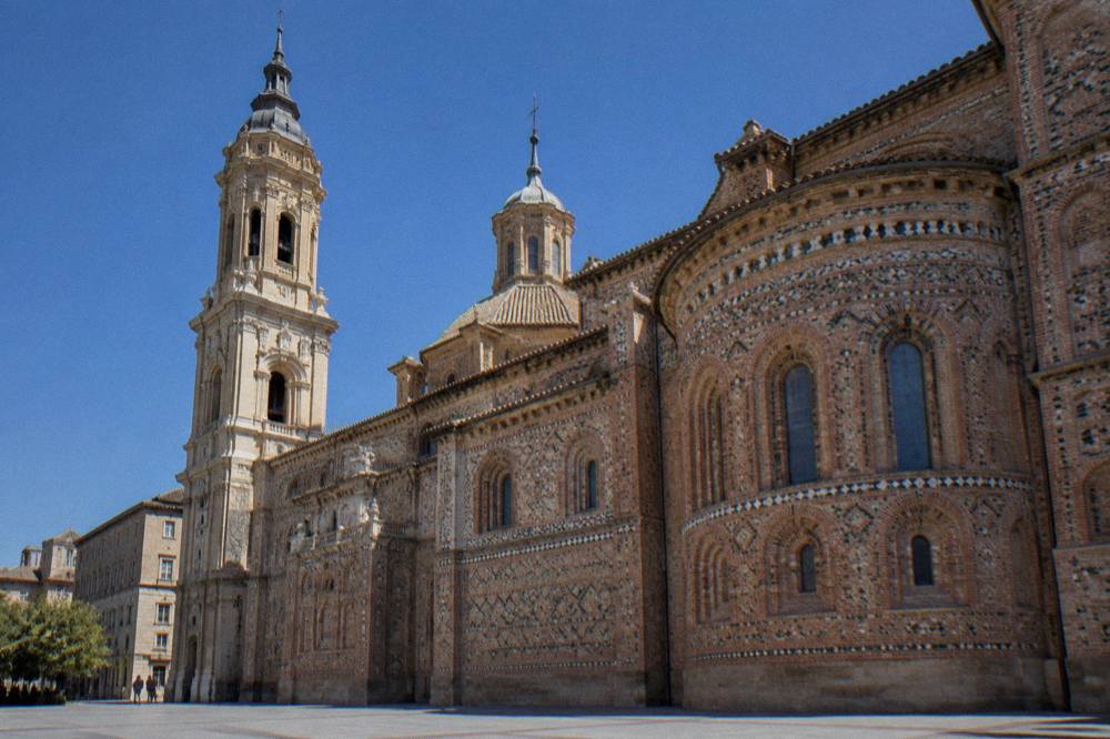 The brick apse and cimborio of La Seo cathedral seen from the plaza in Zaragoza