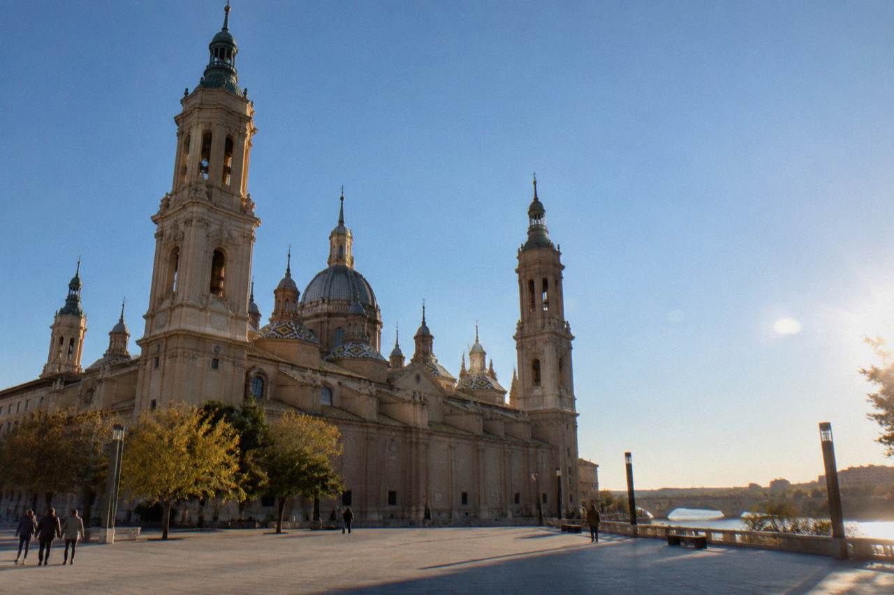 The Basilica del Pilar rising above its square in Zaragoza with the Ebro river beyond