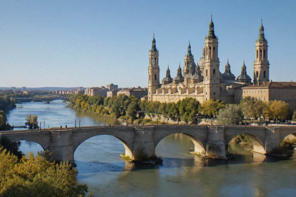 View from a basilica tower over the Puente de Piedra and the Ebro river in Zaragoza