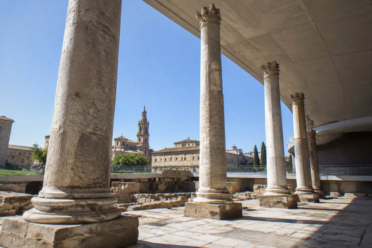 Stone Roman forum remains with columns standing in central Zaragoza