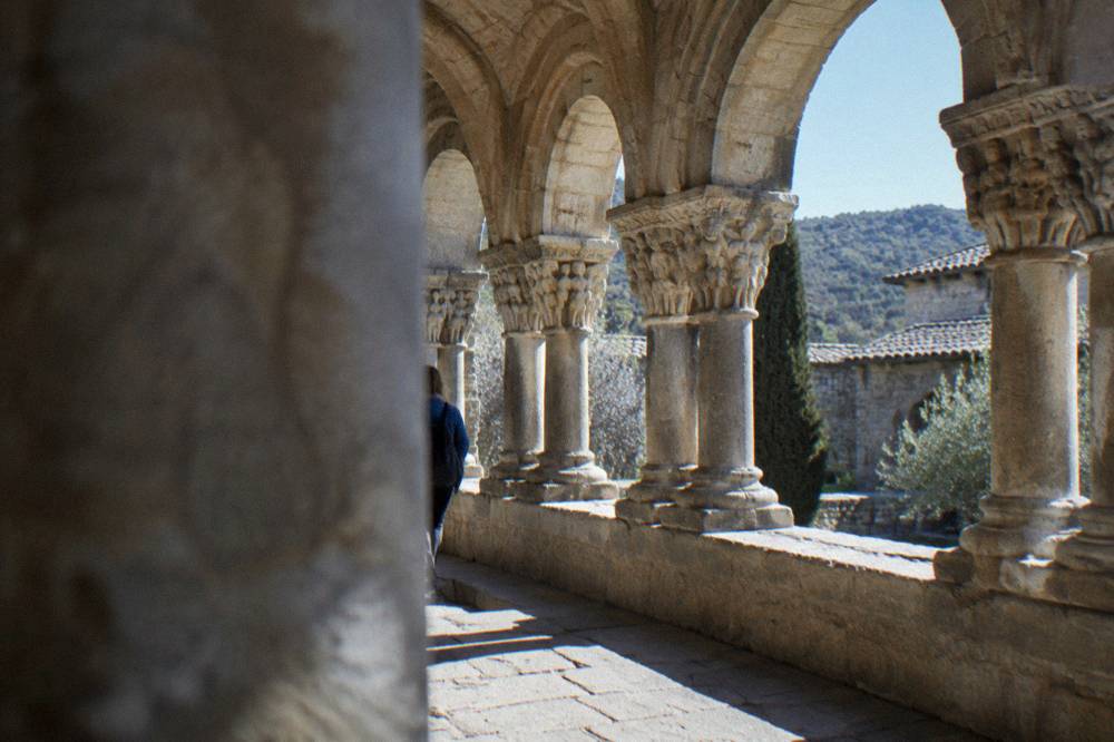 Carved Romanesque capitals and arches of the upper cloister of San Juan de la Peña