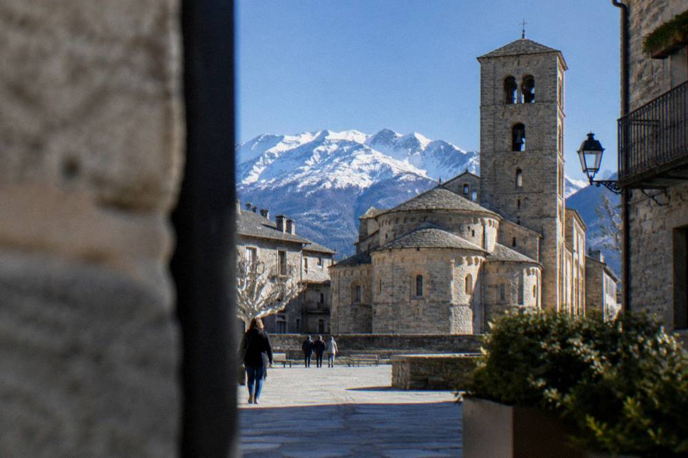 The mountain town of Jaca with its Romanesque cathedral bell tower under a clear sky