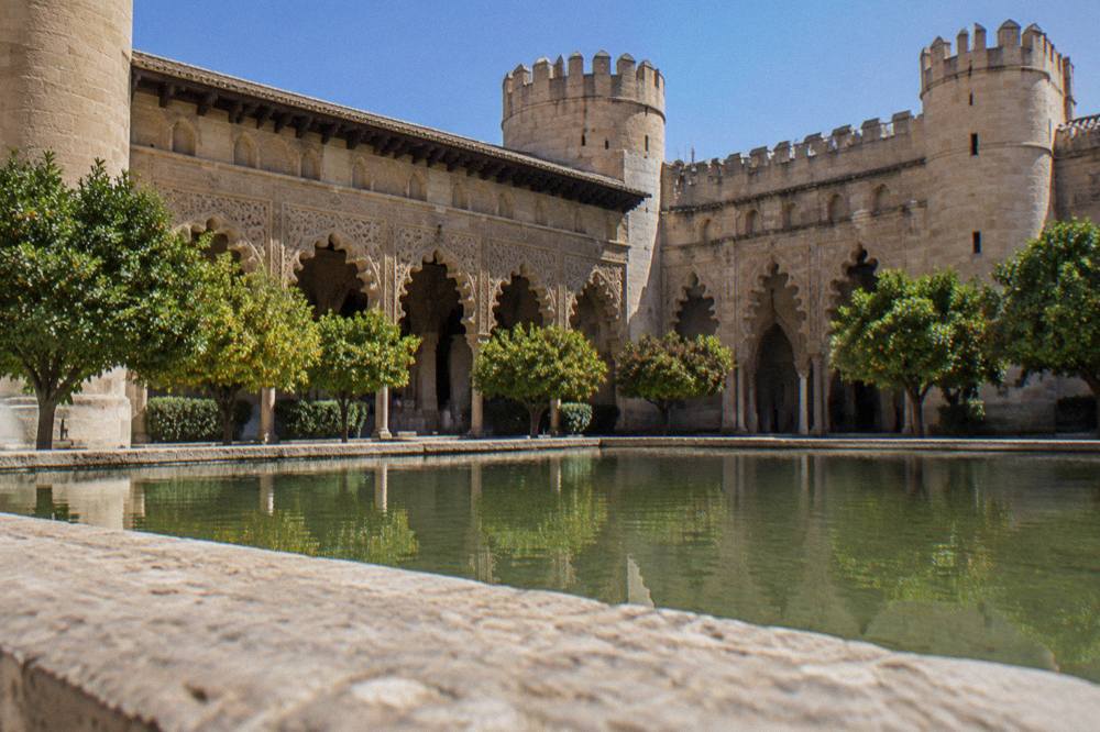 The ornate Moorish arches and carved ceilings inside the Aljafería palace in Zaragoza