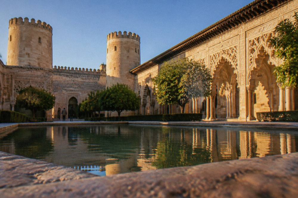 The Aljafería Palace courtyard with its Islamic arches and carved plasterwork
