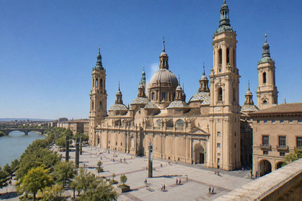 The baroque interior of the Basilica del Pilar seen from the main nave