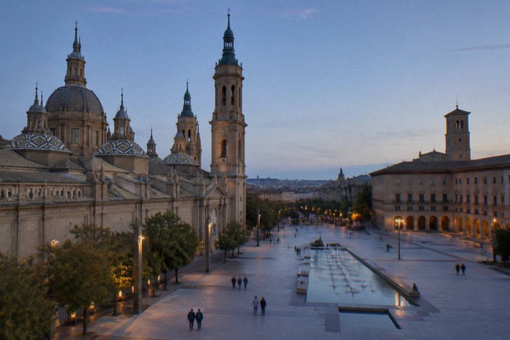 Low evening light over the rooftops and towers of Zaragoza old town