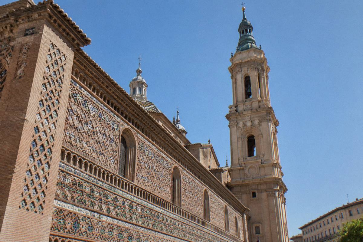 The Mudejar brick wall of La Seo cathedral with its patterned facade
