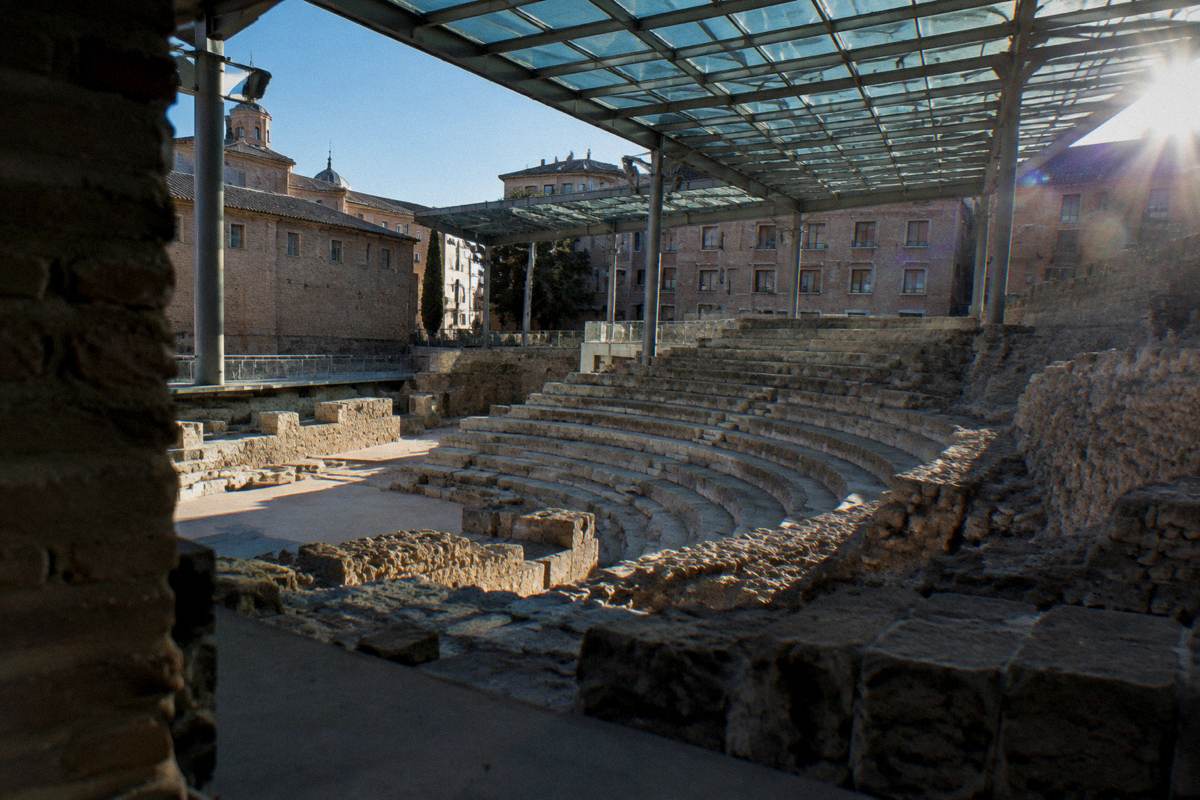 Stepped Roman theatre seating excavated below a modern museum roof