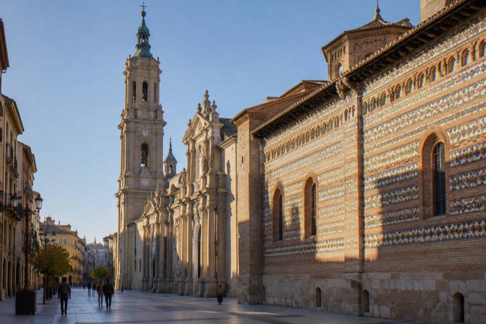 The baroque facade of La Seo cathedral beside the narrow lanes of Zaragoza's old town